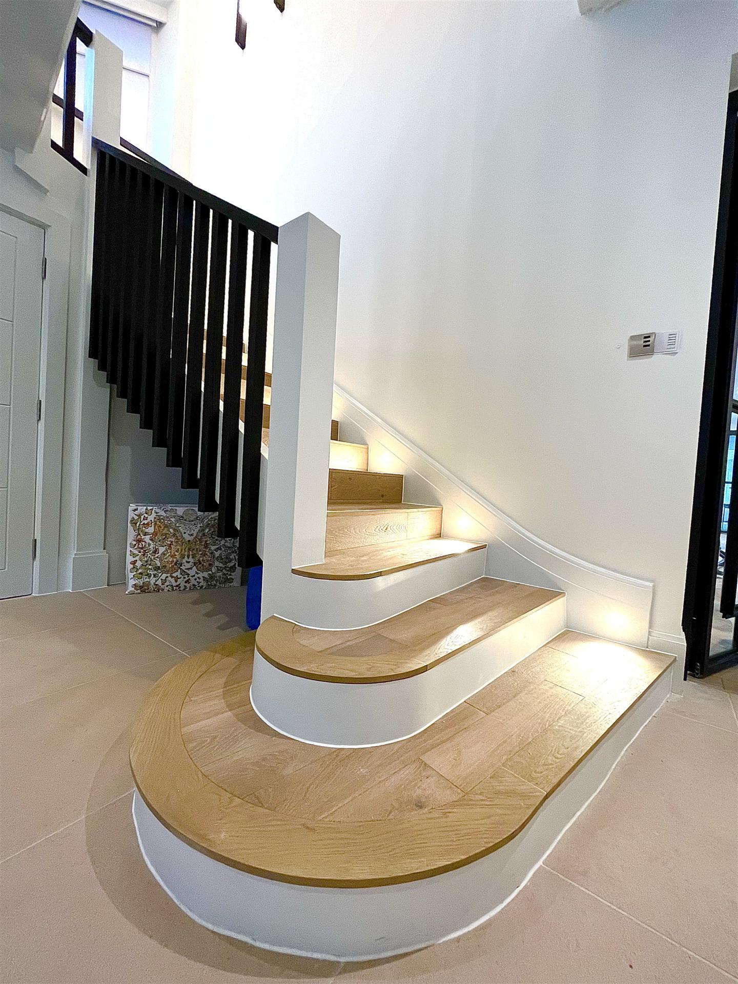 Curved staircase with illuminated risers, luxury finish, Essex